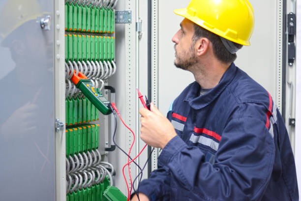 Engineer checking cabling power line and testing for voltage